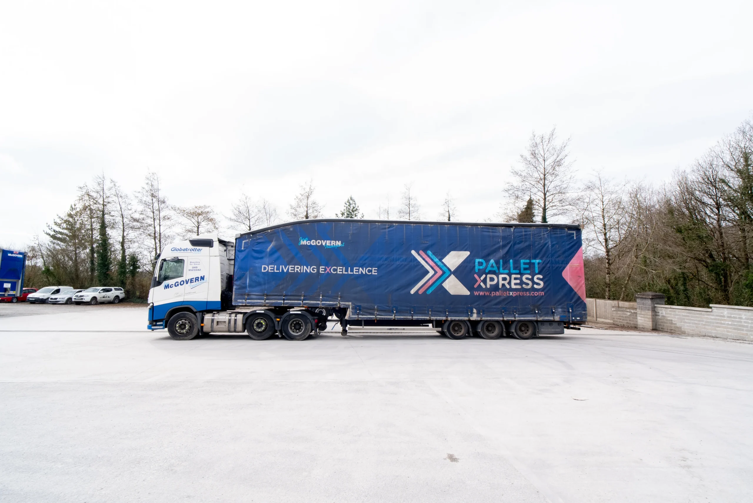 Palletised freight being loaded onto a truck