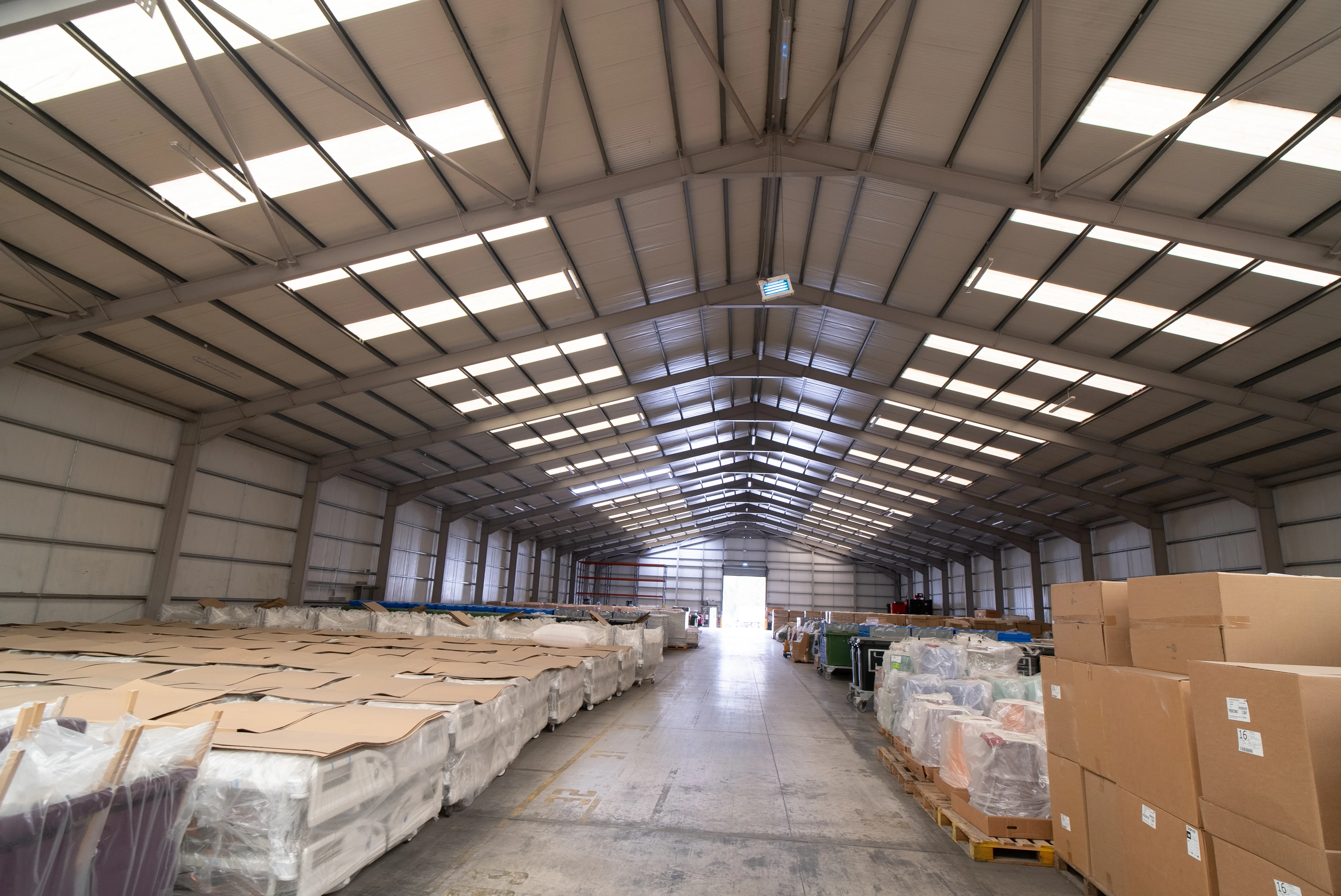 Managed pallet storage Ireland - block-stacked pallets inside Joe McGovern Transport warehouse